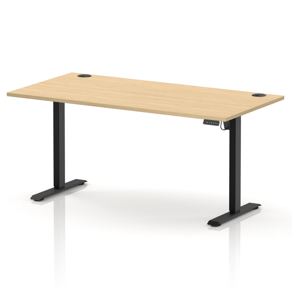 An adjustable height standing desk with a light wood grain top and black metal legs, shown on a clean white background.