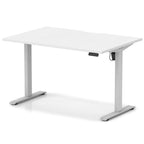 Height adjustable desk with white top and silver frame on a white background