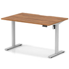 Height adjustable desk with wood-effect top and silver frame on a white background