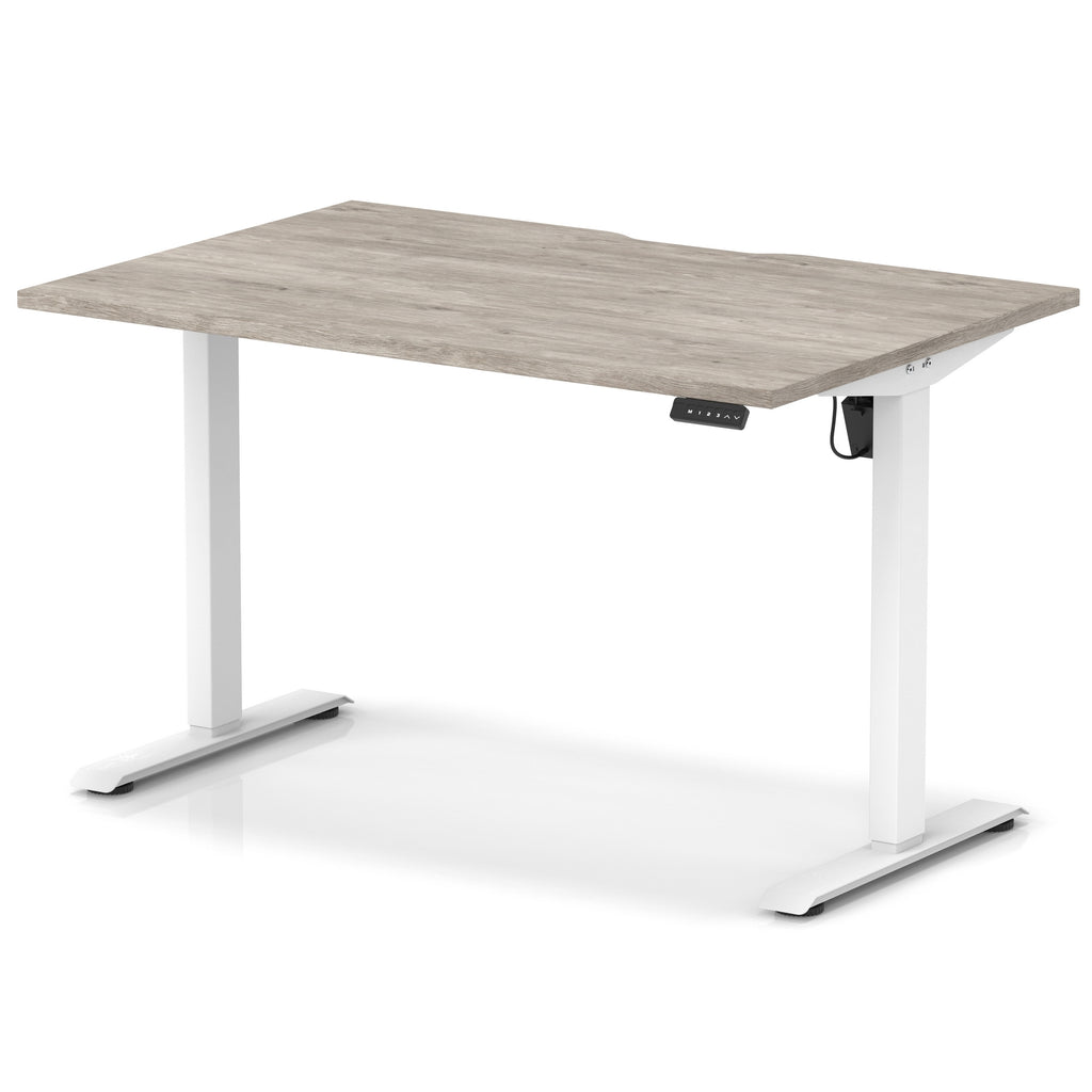 Height adjustable desk with grey wood-effect top and white frame on a white background