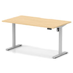 Height adjustable desk with wood-effect top and silver frame on a white background