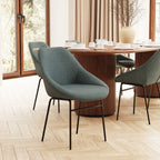 Modern dining room with a wooden table and grey chairs.