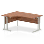 L-shaped desk with wood-effect top and metal legs on a white background