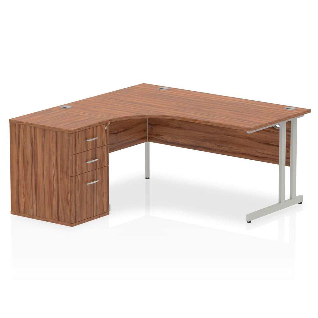 Wood-effect L-shaped desk with metal legs on a white background