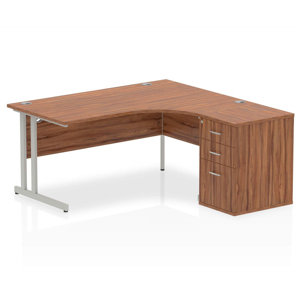 Wood-effect L-shaped desk with metal legs on a white background