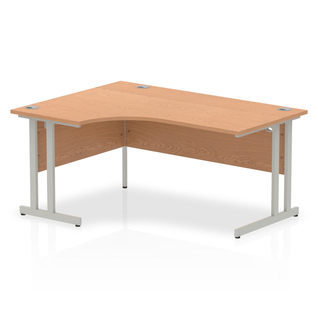  L-shaped desk with wood-effect top and metal legs on a white background