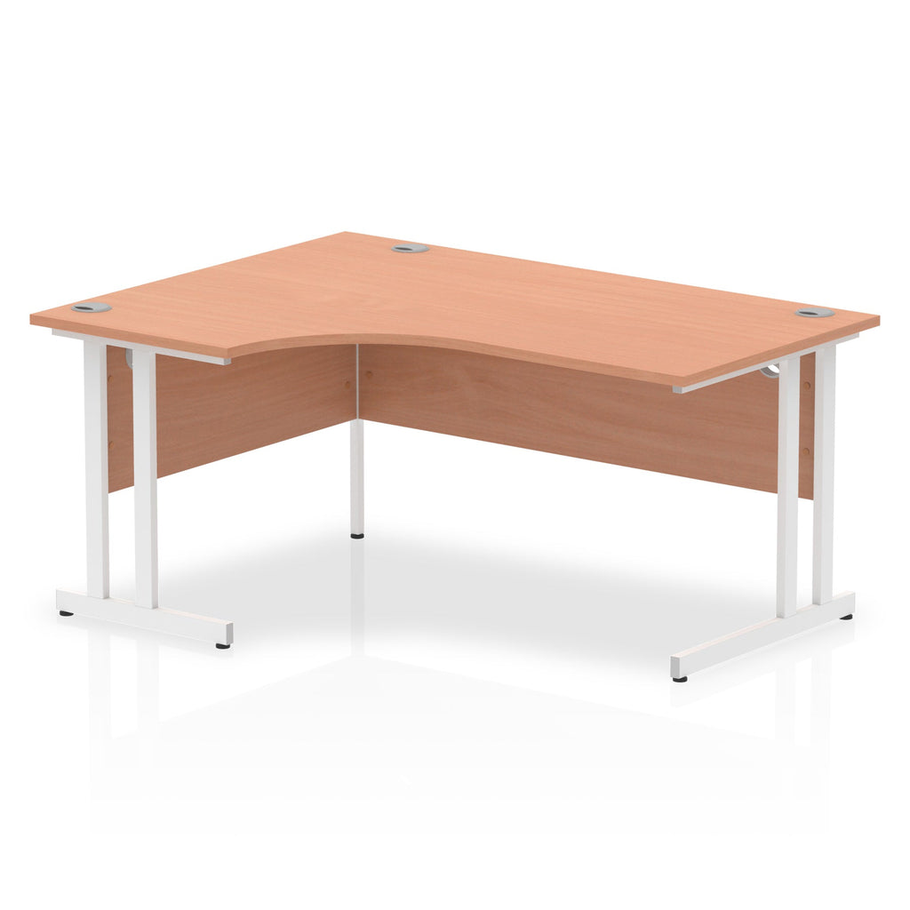  L-shaped desk with wood-effect top and metal legs on a white background