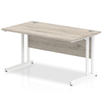 Office desk with wood-effect top and metal frame on a white background
