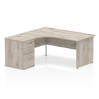 Wood-effect L-shaped desk with drawers on a white background