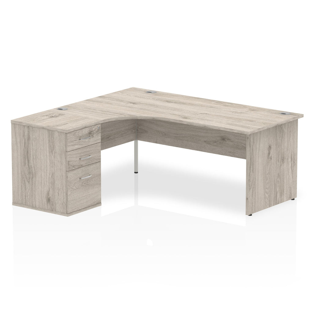 Wood-effect L-shaped desk with drawers on a white background