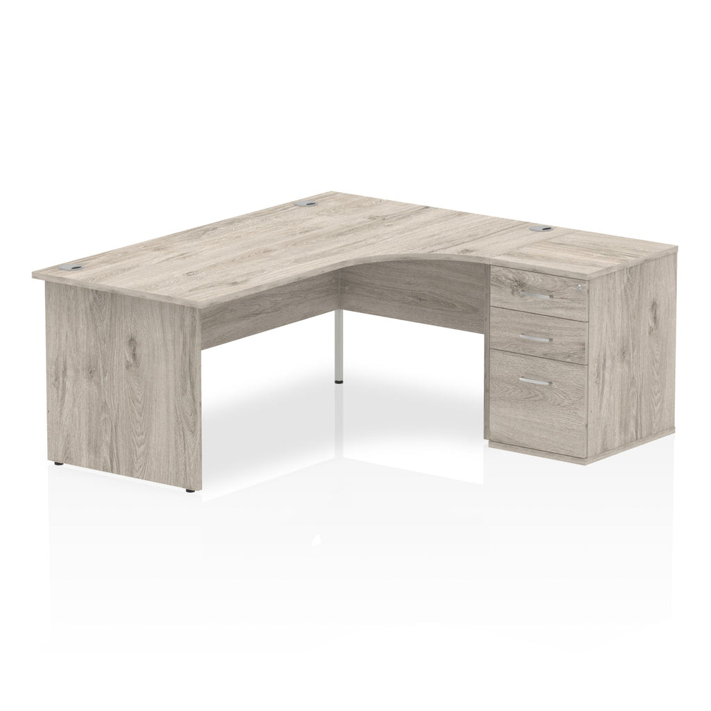 Wood-effect L-shaped desk with drawers on a white background