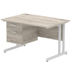 Office desk with grey wood-effect top and fixed pedestal with metal frame on a white background 