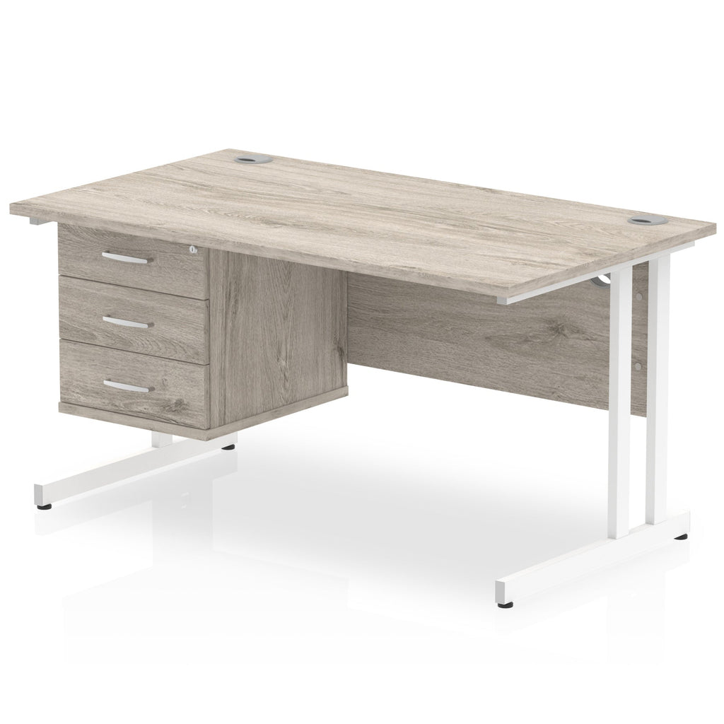 Grey wood-effect office desk with fixed pedestal and metal legs on a white background