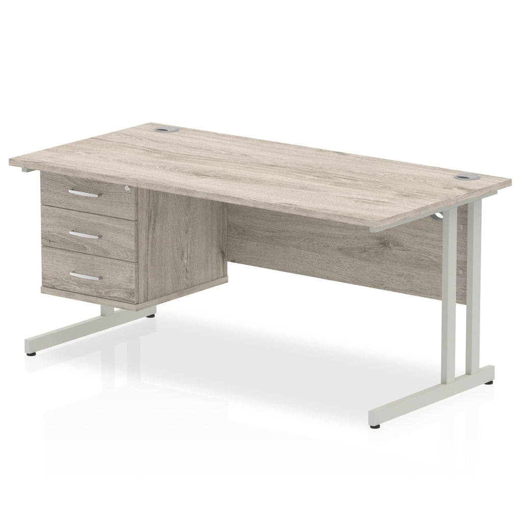 Wood-effect office desk with drawers and metal legs on a white background