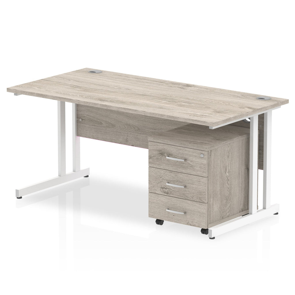 Grey wood-effect office desk with a matching pedestal unit and a metal frame on a white background