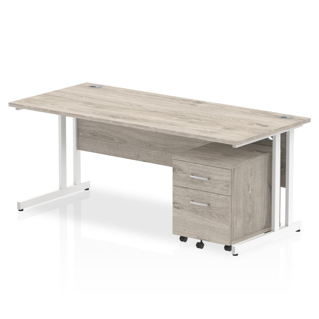 Grey wood-effect office desk with a matching pedestal unit and a metal frame on a white background