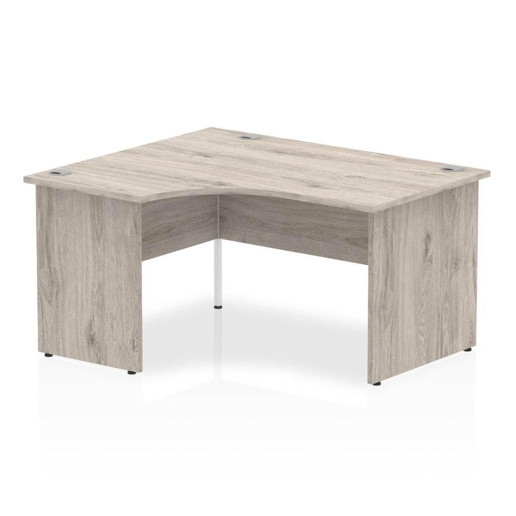 Grey wood-effect L-shaped desk on a white background