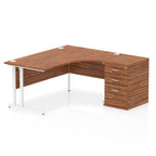 Wood-effect L-shaped desk with metal legs on a white background
