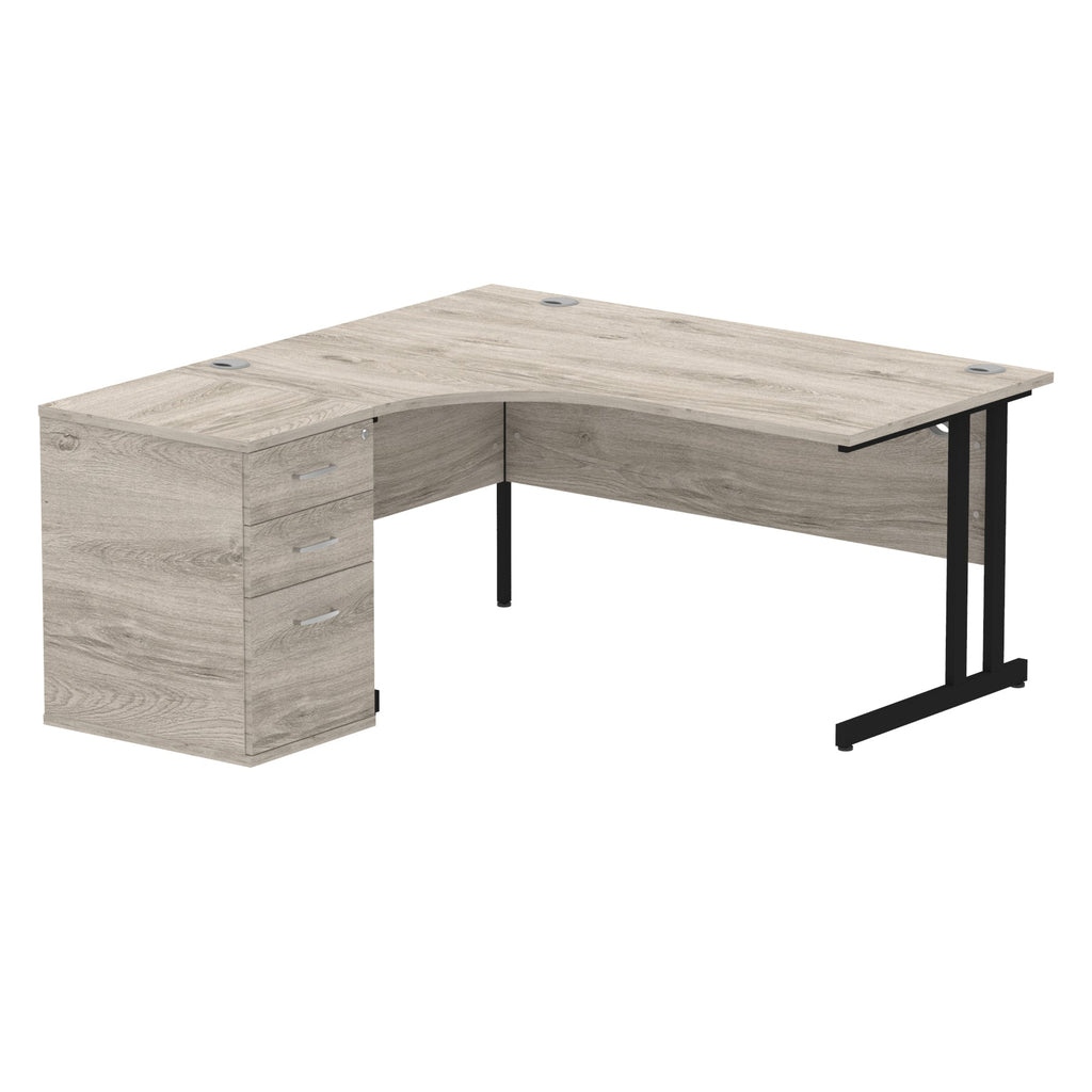 Wood-effect L-shaped desk with metal legs on a white background