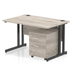 Grey wood-effect office desk with a matching pedestal unit and a metal frame on a white background