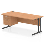 Office desk with wood-effect top, matching drawers and metal legs on a white background