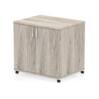 Grey wood-effect storage cabinet with two doors on wheels against a white background