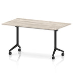 Rectangular table with a grey wood-effect flip top and black metal legs on wheels against a white background
