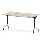 Rectangular table with a grey wood-effect flip top and black and chrome metal legs on wheels against a white background