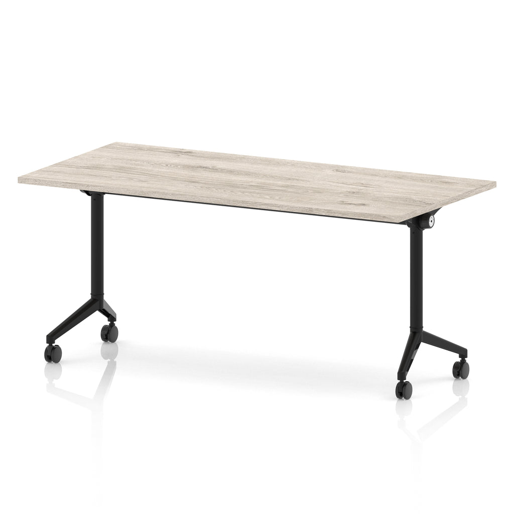 Rectangular table with a grey wood-effect flip top and black metal legs on wheels against a white background