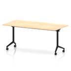 Rectangular table with a wood-effect flip top and black metal legs on wheels against a white background