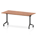 Rectangular table with a wood-effect flip top and black metal legs on wheels against a white background