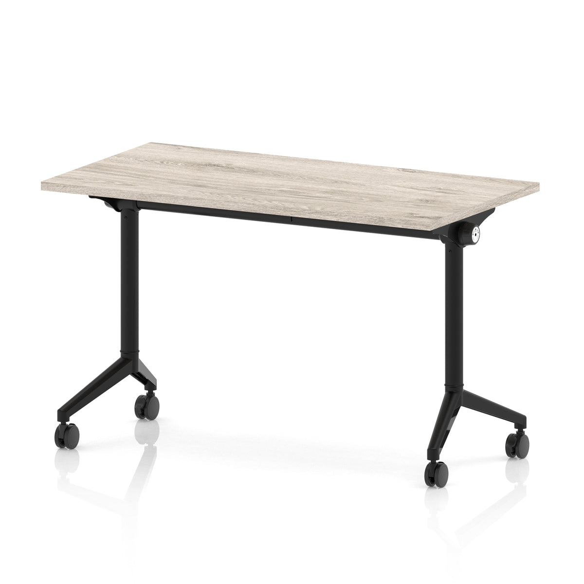 Rectangular table with a grey wood-effect top and black metal legs on wheels against a white background