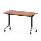 Rectangular table with a wood-effect top and black metal legs on wheels against a white background