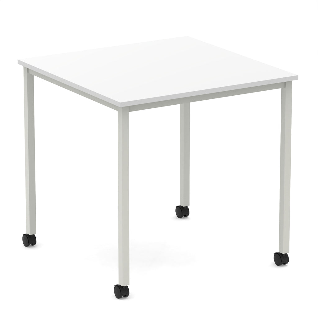 Square table with a white top and metal legs with castors on a white background