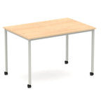 Rectangular table with a wood-effect top and metal legs with castors on a white background
