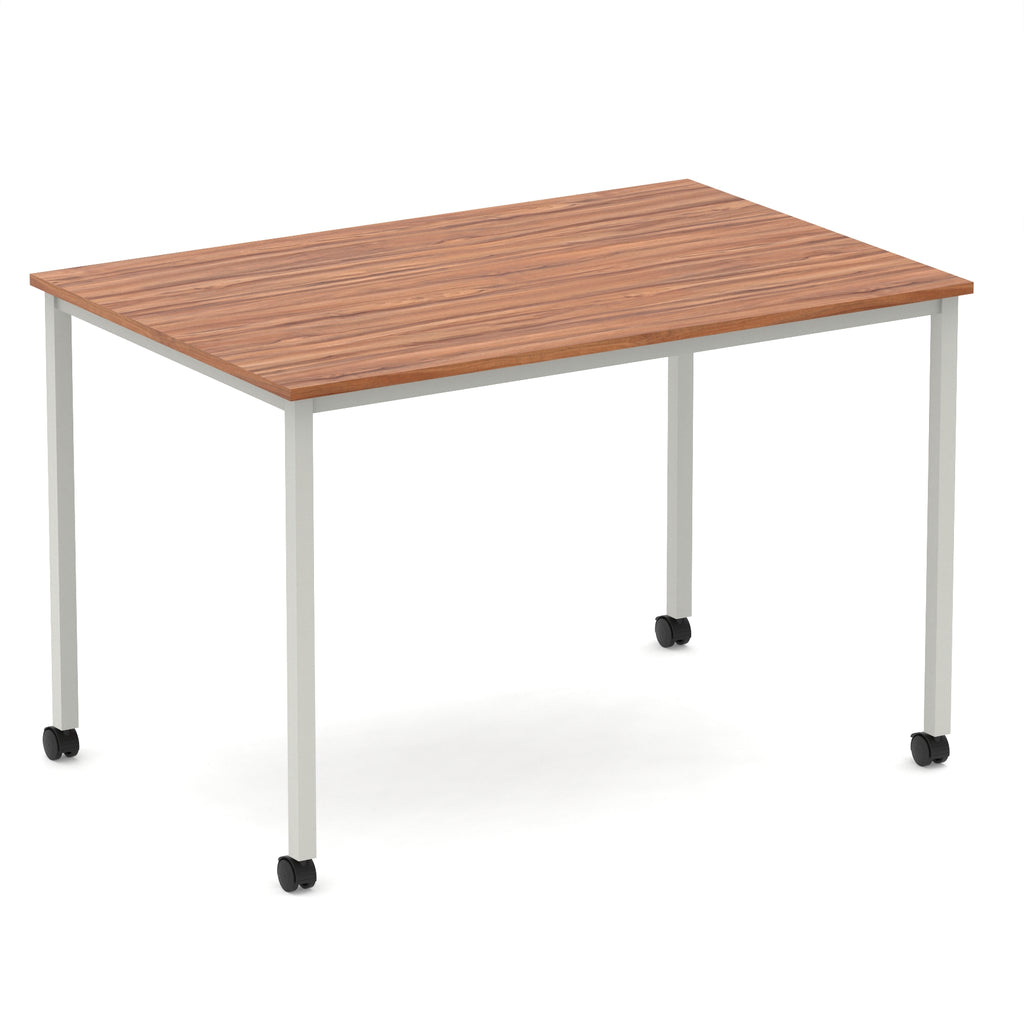 Rectangular table with a wood-effect top and metal legs with castors on a white background