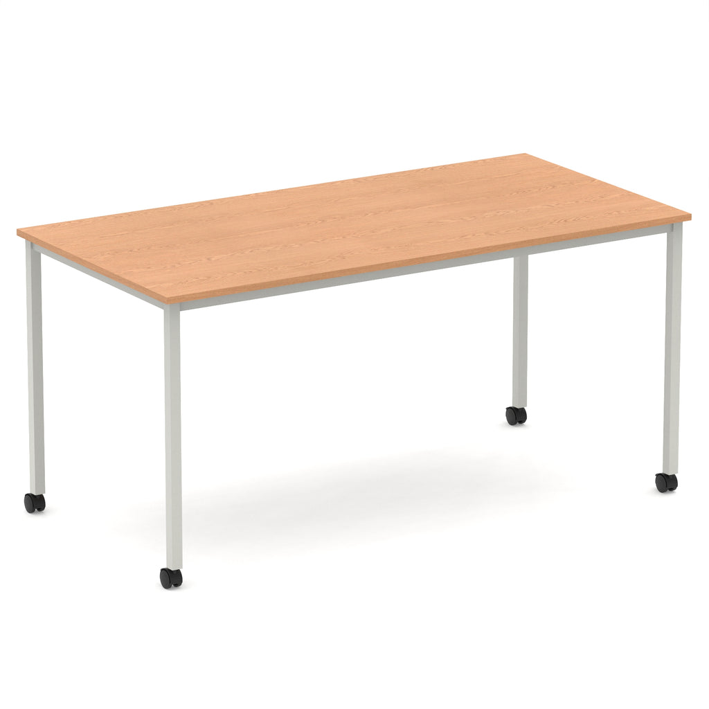 Rectangular table with a wood-effect top and metal legs with castors on a white background