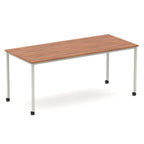 Rectangular table with a wood-effect top and metal legs with castors on a white background