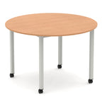 Round table with wood-effect top and metal legs with castors on a white background