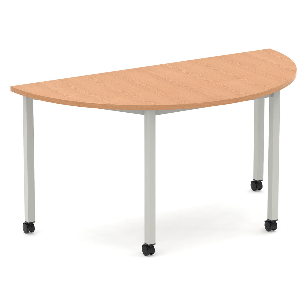 Half-circle shaped table with wood-effect top and metal legs with castors on a white background