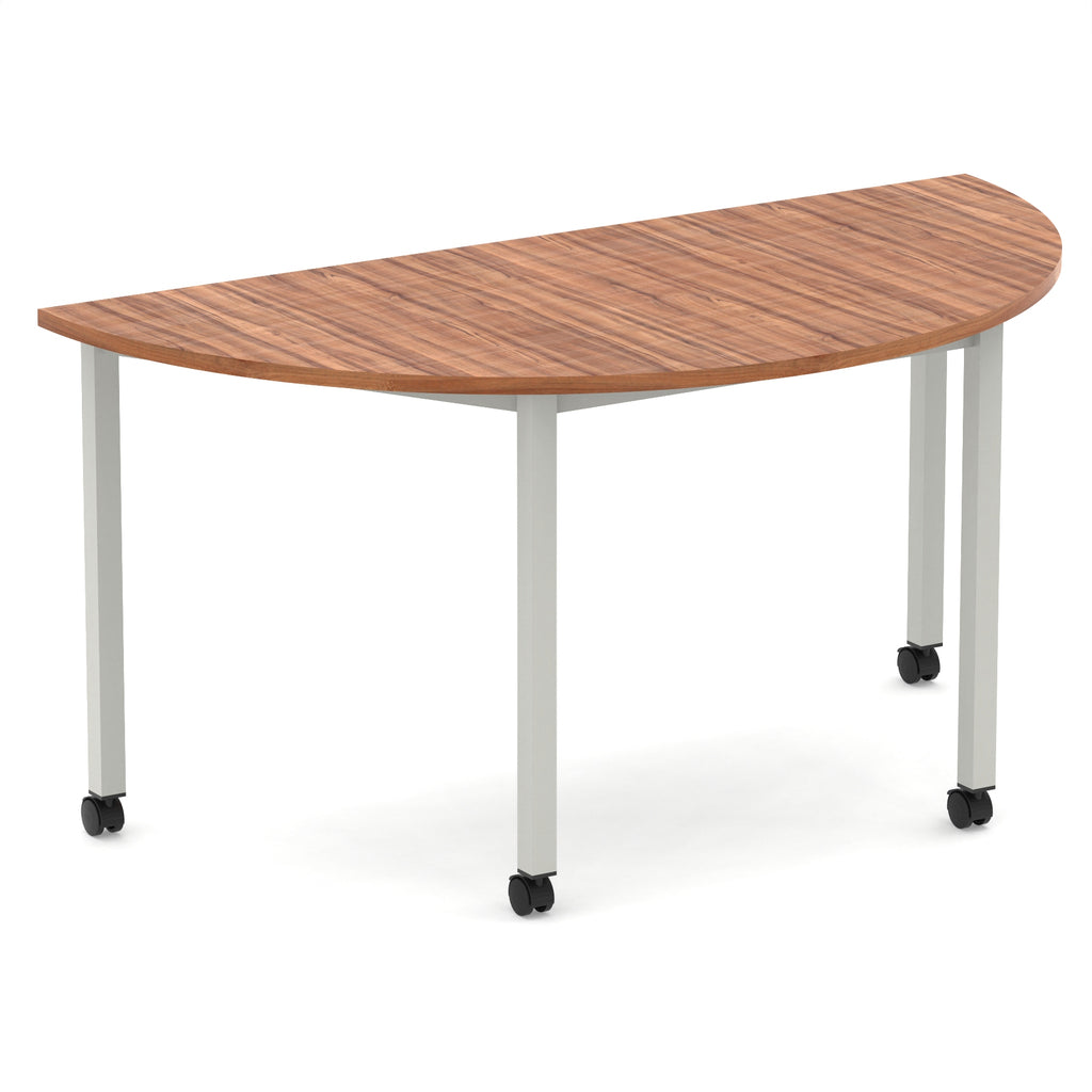 Half-circle shaped table with wood-effect top and metal legs with castors on a white background