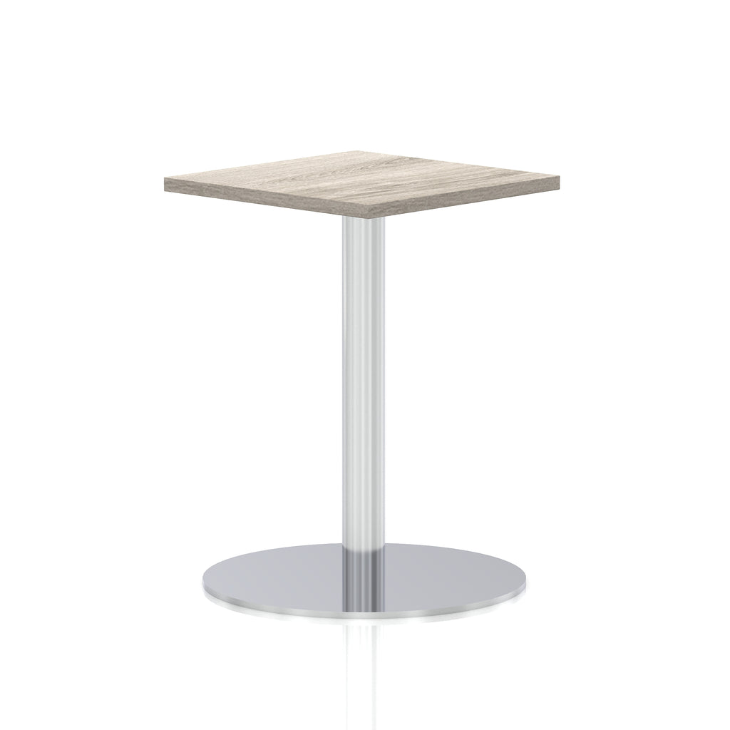 Square table with a grey wood-effect top and silver cylindrical base on a white background