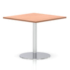 Square table with a wood-effect top and silver cylindrical base on a white background