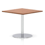 Square table with a wood-effect top and silver cylindrical base on a white background