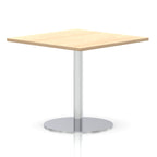 Square table with a wood-effect top and silver cylindrical base on a white background