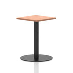 Square table with a wood-effect top and black cylindrical base on a white background