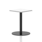 Square table with a white top and black cylindrical base on a white background