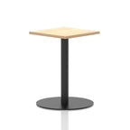 Square table with a wood-effect top and black cylindrical base on a white background