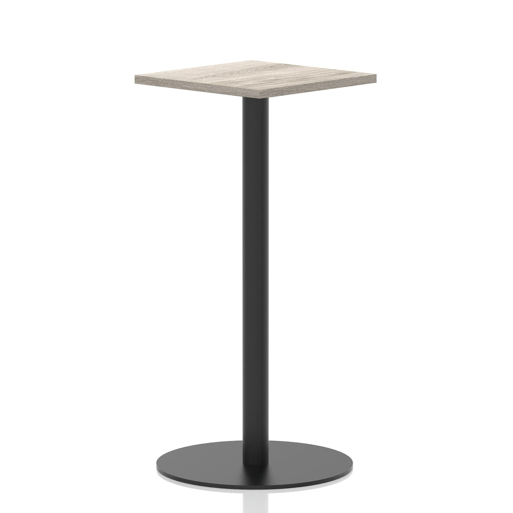 Square high table with a grey wood-effect top and black cylindrical base on a white background