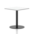 Square table with a white top and black cylindrical base on a white background